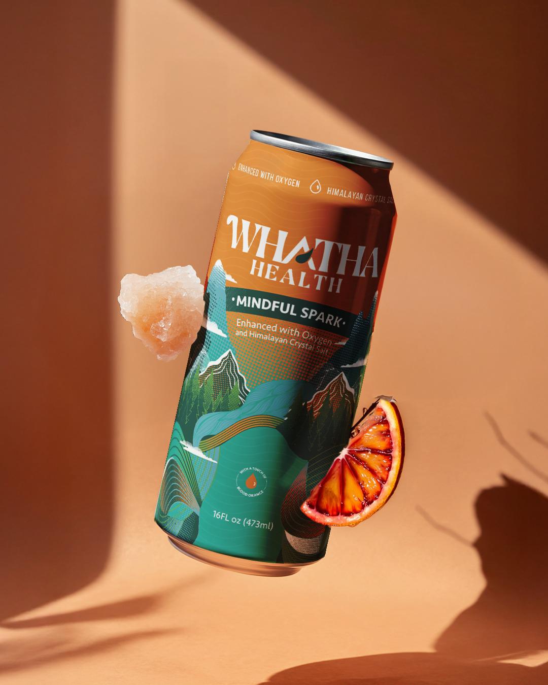 Whatha Health can with a slice of blood orange on an orange background